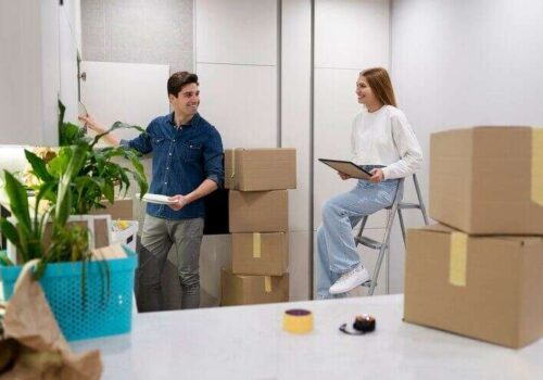 couple-unpacking-their-belongings_23-2149312726 (1) Trusted Moving Company in Mississauga